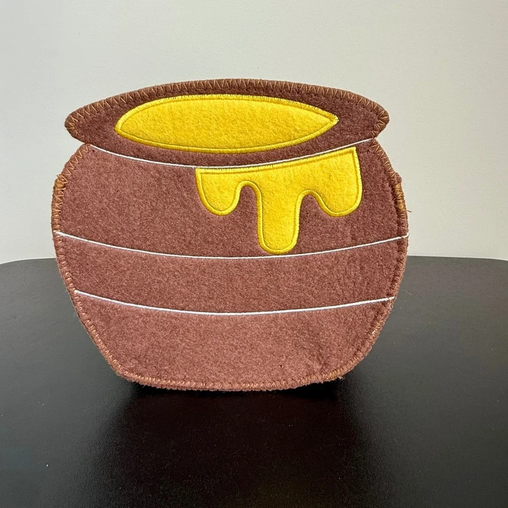 Disney Baby Winnie the Pooh & Hunny Pot 2-Piece Felt Storage Caddy Set.